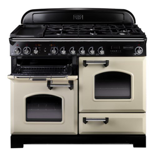 Classic 110cm dual fuel range cooker in cream with chrome trim, featuring a black control panel, five gas burners, two ovens, and a griddle on top.