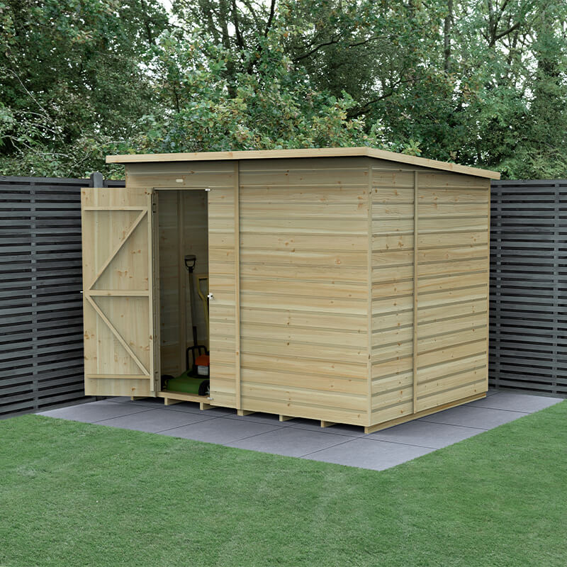 Wooden pent shed with a natural wood finish, featuring shiplap construction, a slanted roof, and a double door entrance, set on a grassy area with a backdrop of dark fencing.