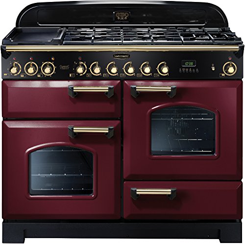 Classic 110cm dual fuel range cooker in cranberry with brass trim, featuring four gas burners, two ovens with glass doors, and a griddle on top.