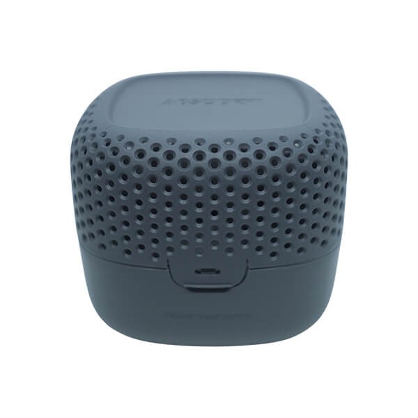 Compact blue moisture absorber with a textured, perforated design, featuring a smooth top and a front opening for easy access, made from durable plastic material.