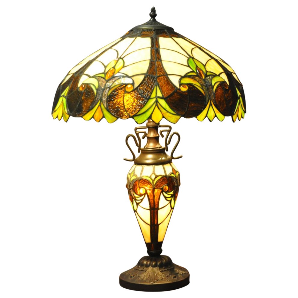 Multicoloured Tiffany lamp featuring a stained glass shade with floral patterns in green, yellow, and brown, supported by an ornate bronze base, standing 68cm tall.