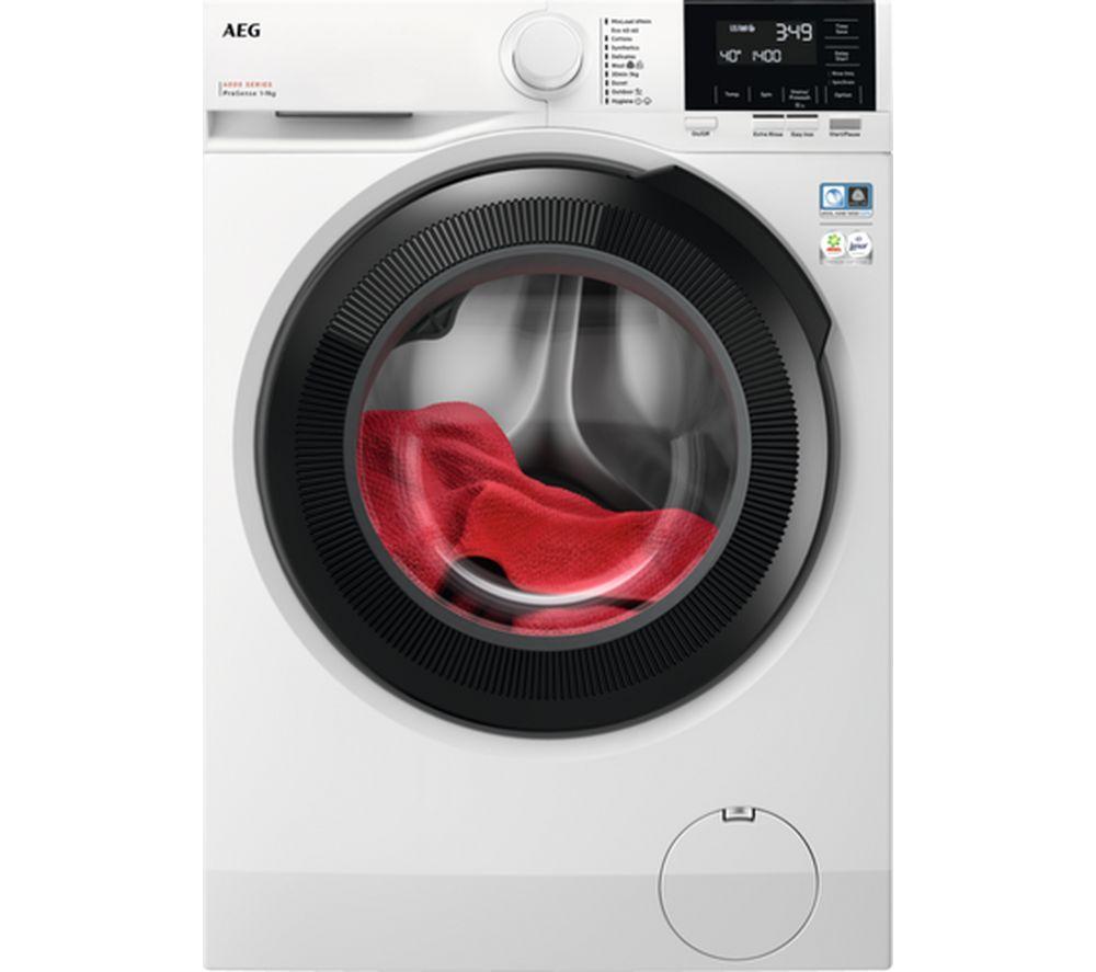 White front-loading washing machine with a large circular glass door displaying red laundry inside, featuring a digital control panel and energy efficiency labels.