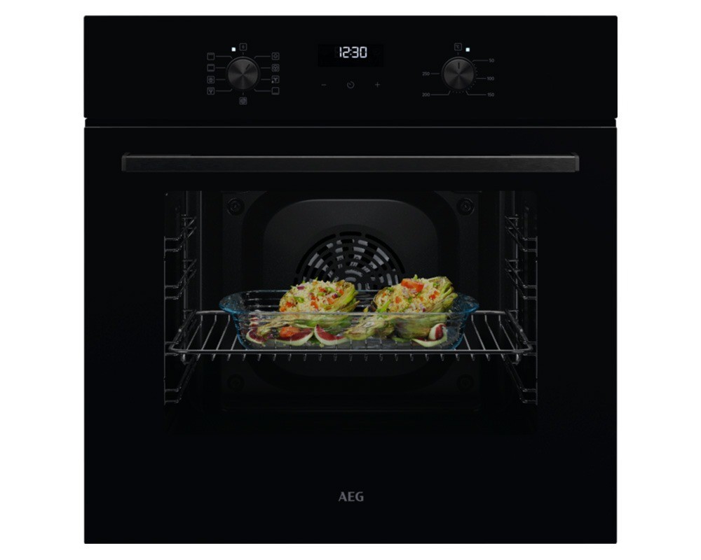 Built-in single oven in sleek black finish featuring a digital display, control knobs, and a glass door showcasing a dish on a wire rack inside.