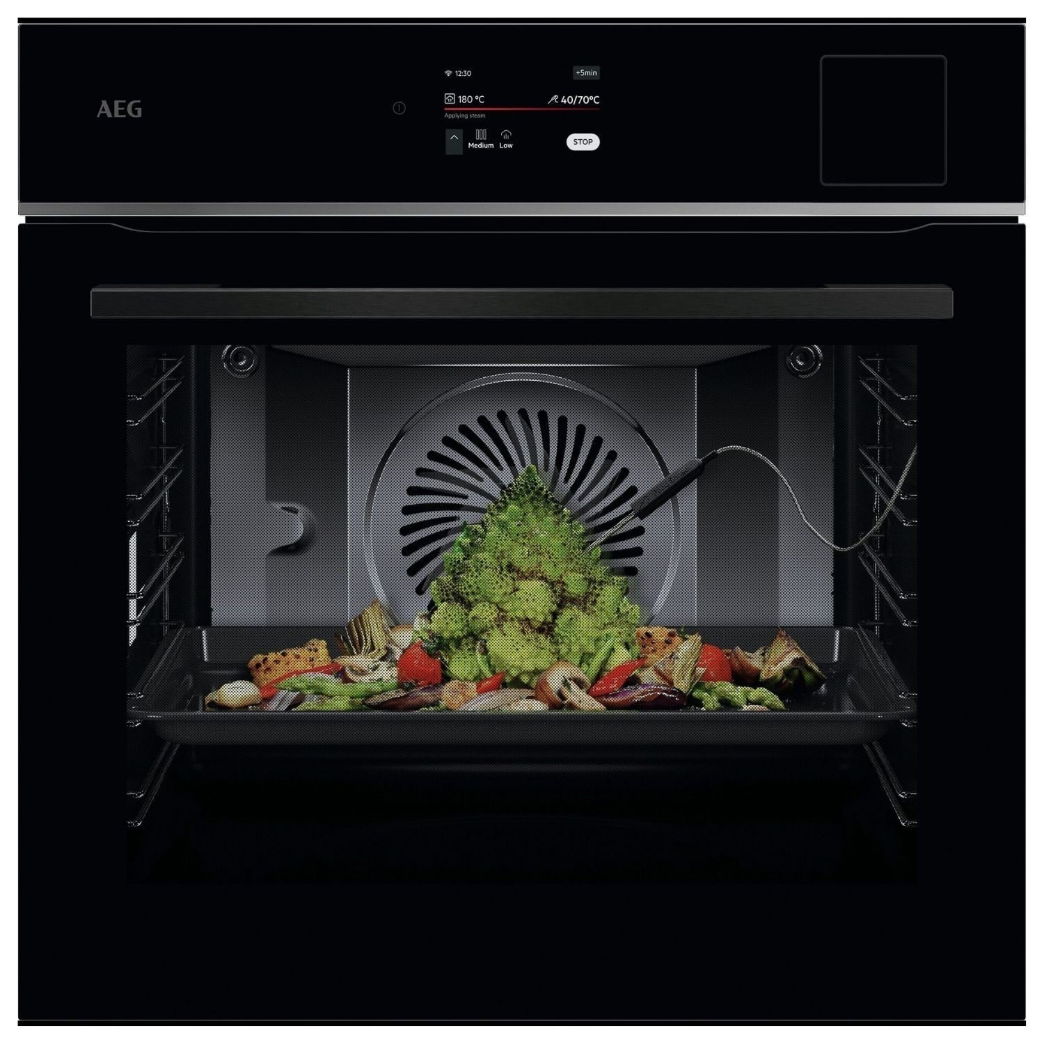 Black AEG 8000 Series TP8SB731AB electric single oven with a steam function, featuring a digital control panel and a view of colorful vegetables inside the oven.