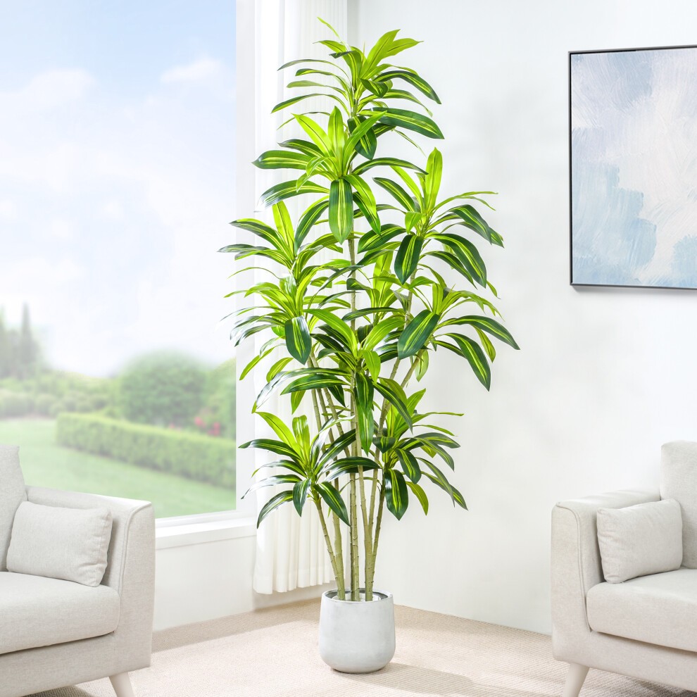 Tall artificial agave tree with vibrant green leaves in a modern white plastic planter, complemented by decorative moss, set in a bright indoor space.