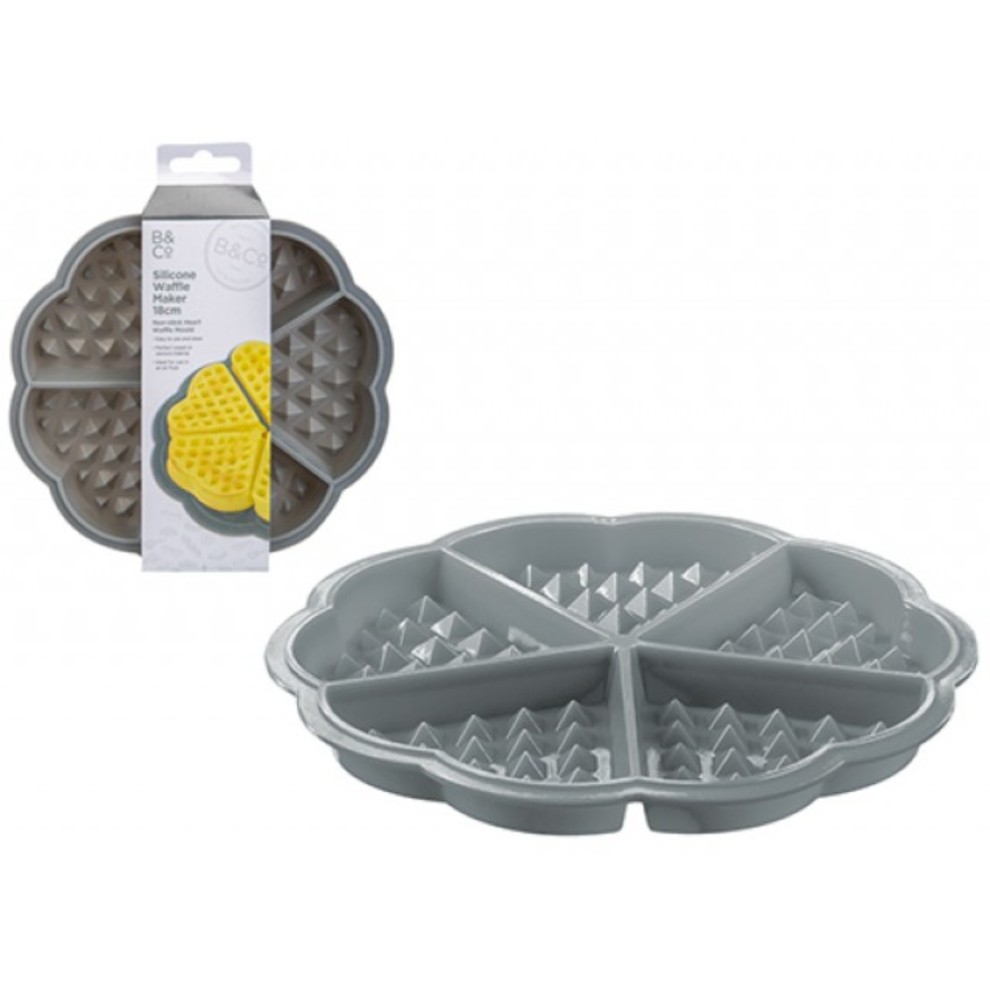 Grey silicone waffle maker with a floral design, featuring four sections for different waffle shapes, accompanied by packaging.