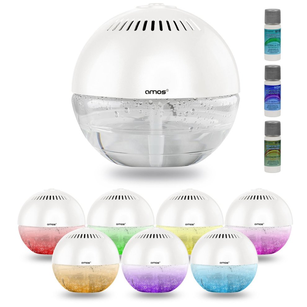 White spherical air revitaliser with a transparent base, featuring a color-changing LED light, accompanied by eight essential oil bottles in various colors.