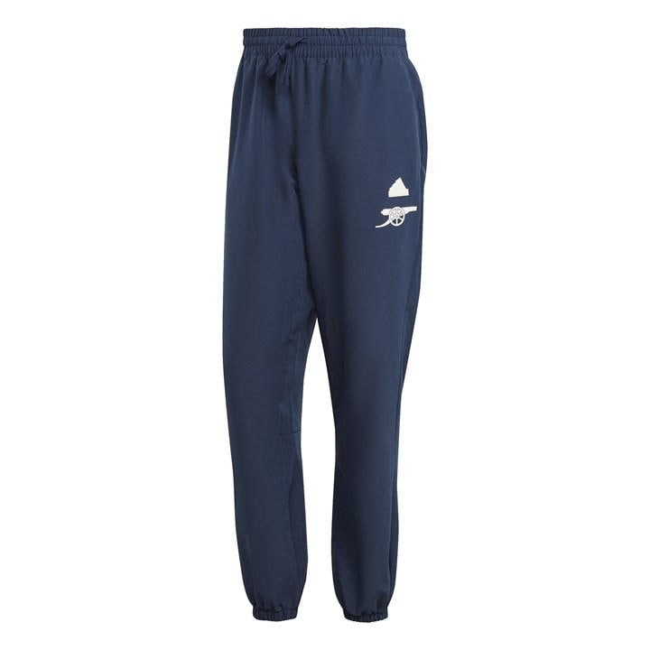 Navy woven pants by Arsenal featuring an elastic waistband with drawstring, tapered legs, and a white Arsenal logo on the left thigh.