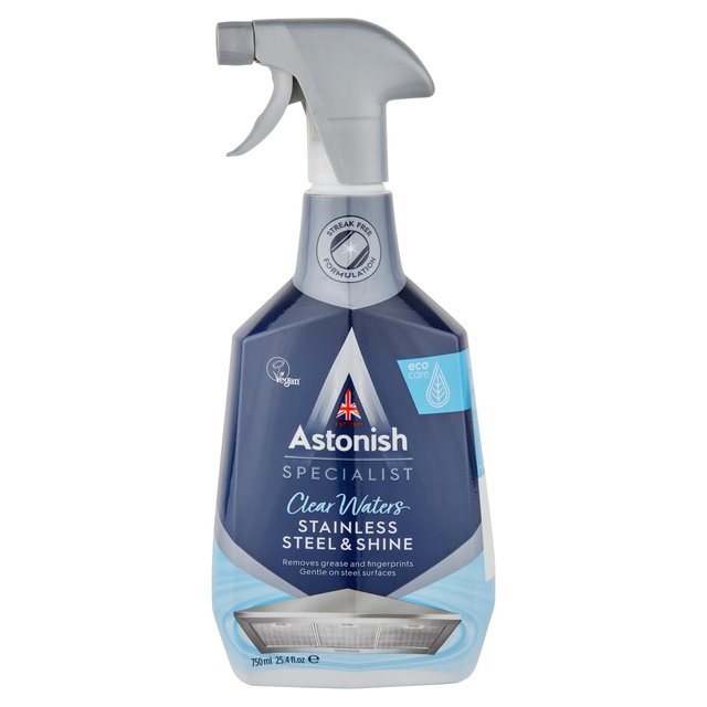 Astonish Specialist Stainless Steel Cleaner & Shine Spray in a blue and silver bottle with a spray nozzle, designed for a streak-free polished finish on stainless steel surfaces.