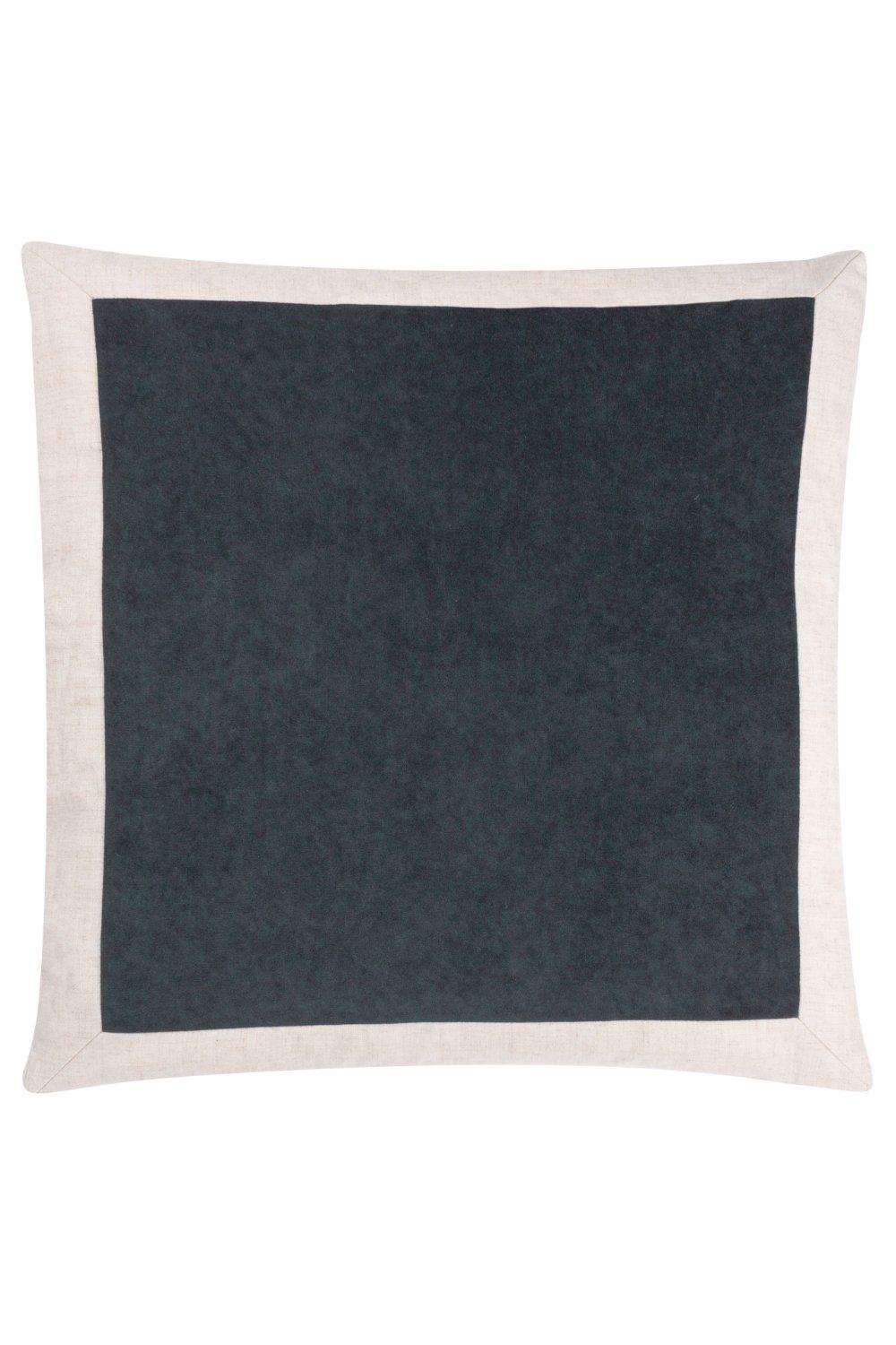 Dark grey velvet cushion filled with soft material, featuring a contrasting light linen border, designed for comfort and style.