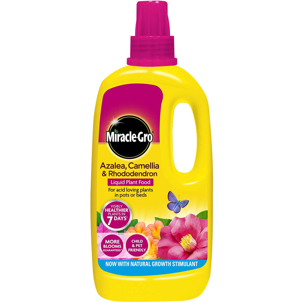 Bright yellow bottle of Miracle-Gro Azalea, Camellia, and Rhododendron liquid plant food, featuring a pink cap and label with floral graphics, designed for acid-loving plants.