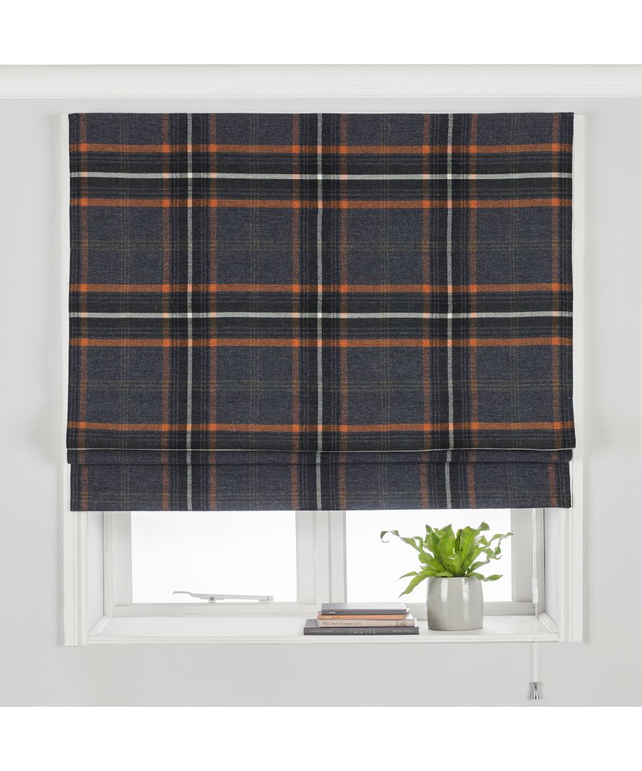Rust-colored roller blind featuring a classic plaid pattern with dark blue, orange, and white lines, made from a textured fabric, hanging neatly in a window.