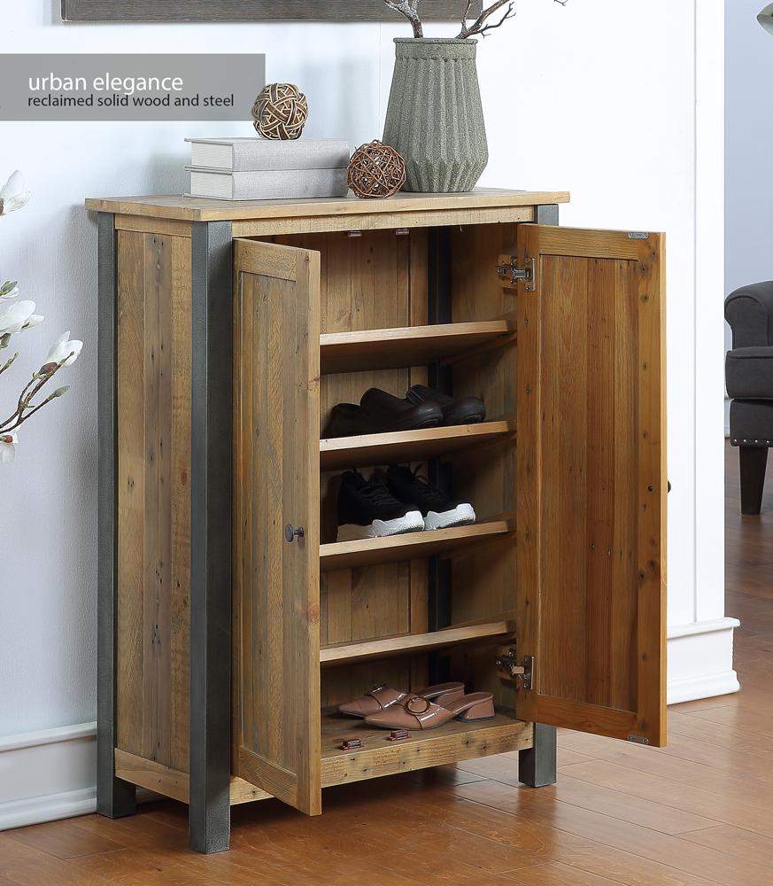 Brown reclaimed wood shoe storage cupboard with steel legs, featuring two doors and four shelves, styled with a vase and decorative items on top.