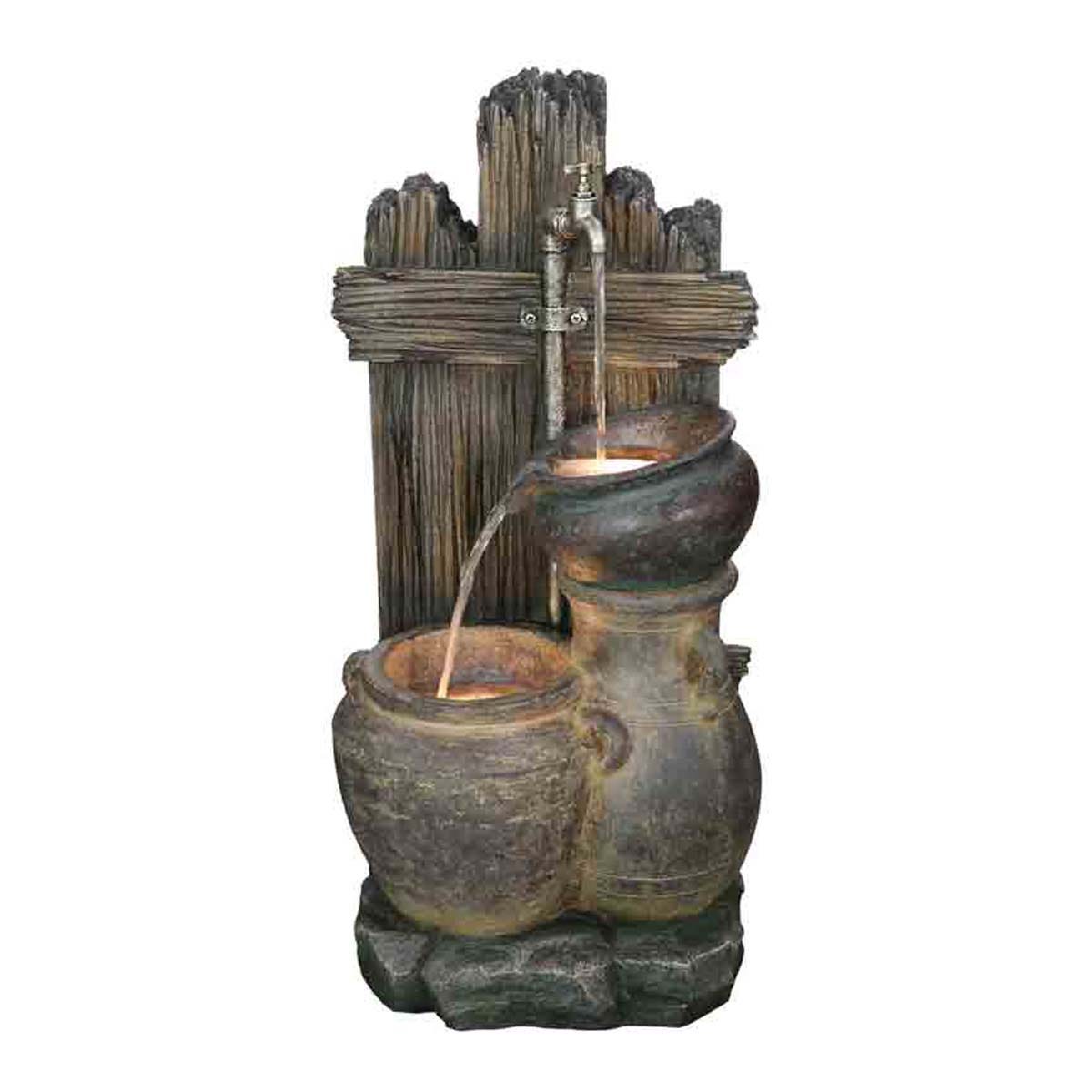 Brown mains-powered water feature with two stacked pots, wooden backdrop, and flowing water, designed for outdoor use by Bermuda Water Gardens.