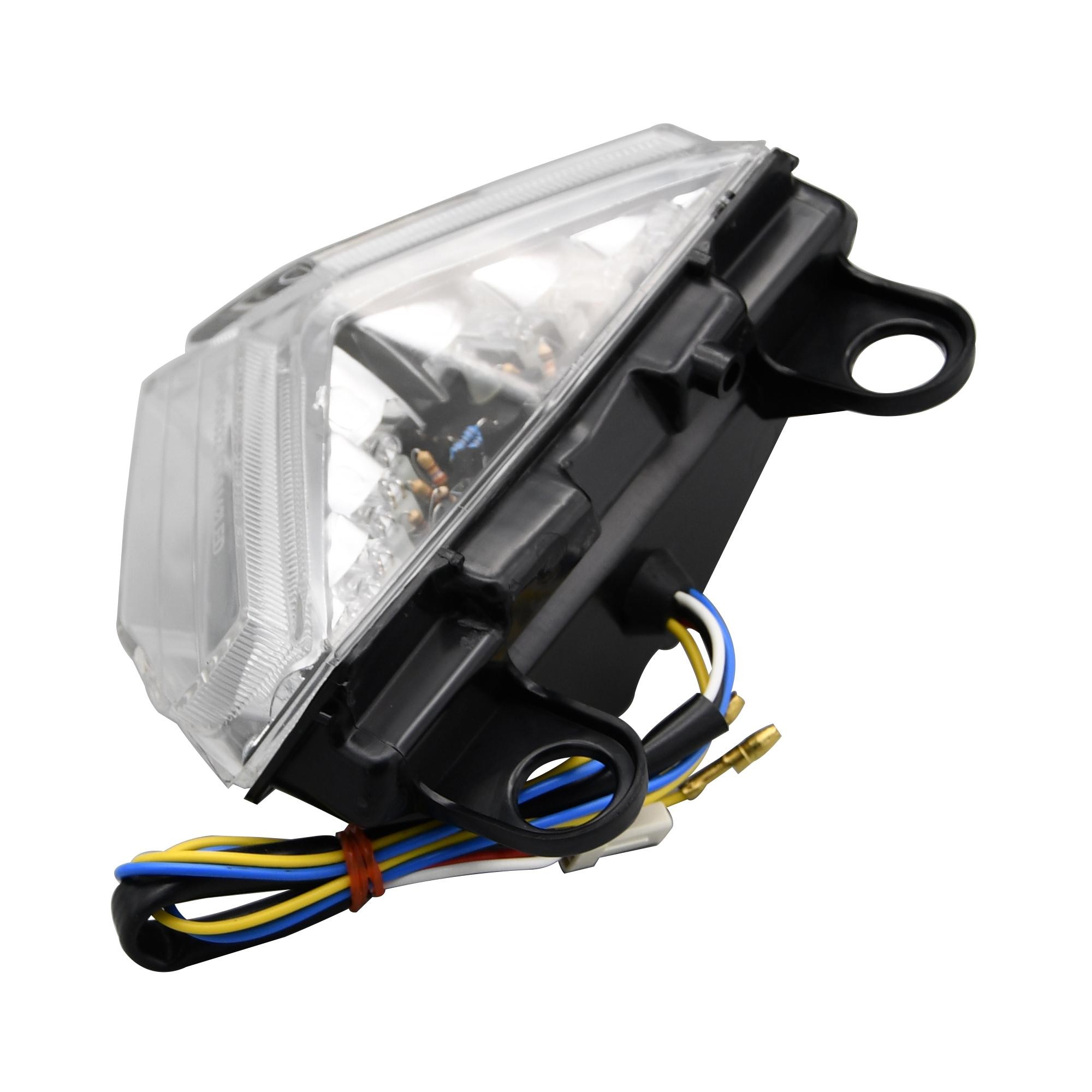 LED rear tail light with clear lens, featuring integral indicators, designed for Ducati 848 (2008-2012), with a black plastic housing and colorful wiring.