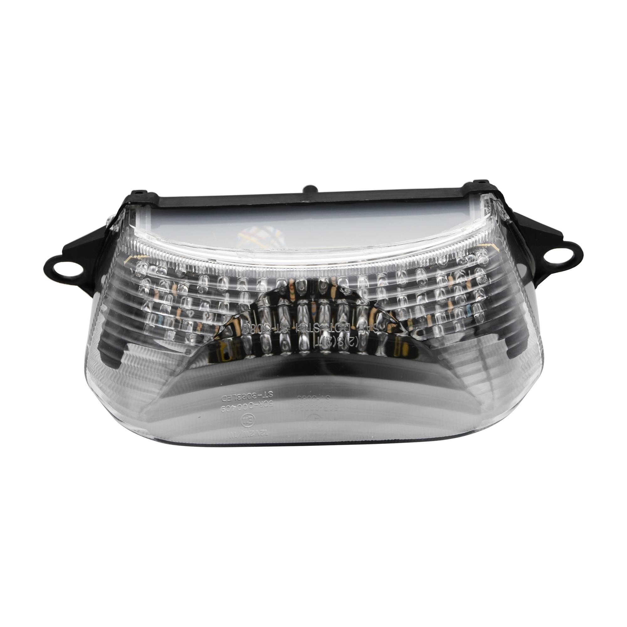 LED rear tail light with a clear lens, featuring integral indicators, designed for Honda VTR1000F Firestorm (1998-2005), with a sleek black plastic casing and multiple light bulbs.