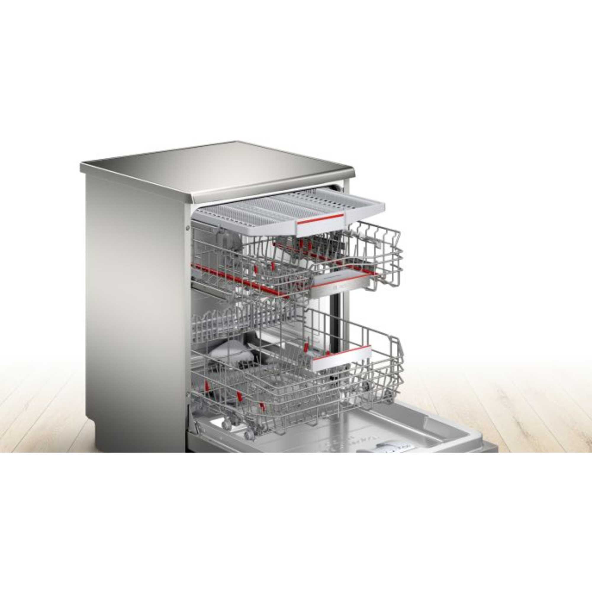 Silver Inox Bosch SMS6TCI01G Series 6 dishwasher with a sleek design, featuring two metal wire baskets and a spacious interior for 14 place settings.