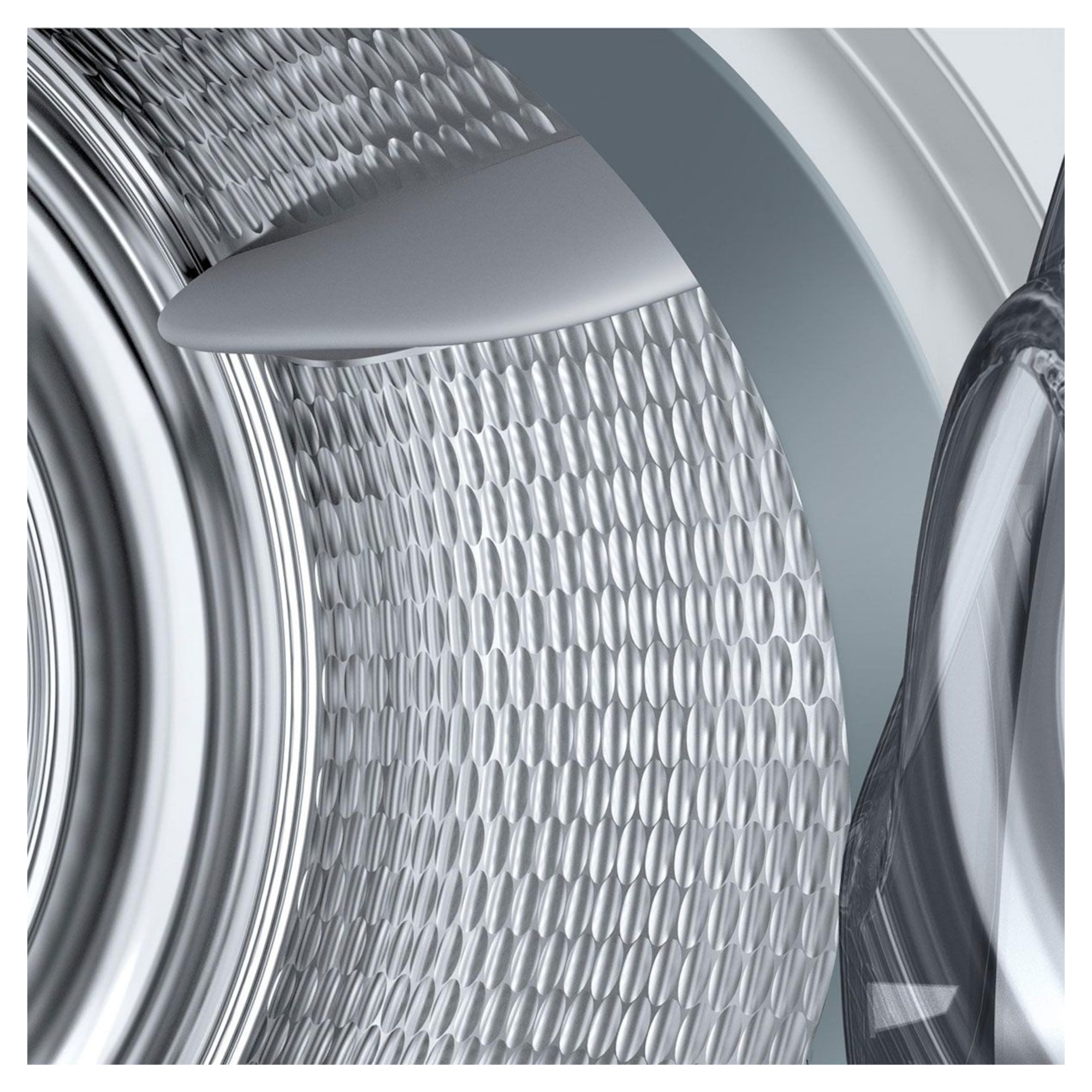Close-up of the Bosch WQB246C9GB heat pump tumble dryer's textured drum interior, featuring a sleek metallic finish and a honeycomb structure for efficient drying.