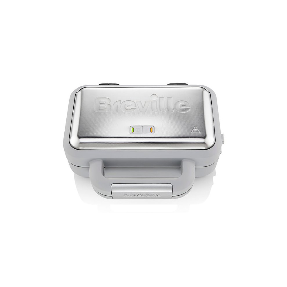 Silver Breville Waffle Maker with a sleek stainless steel finish, featuring a prominent logo, two indicator lights, and a sturdy handle for easy opening.