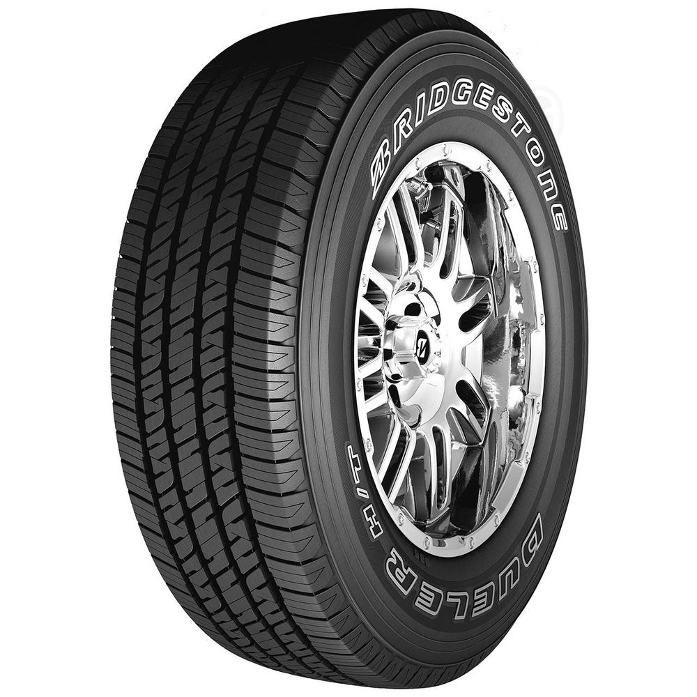 Black Bridgestone Dueler H/T 685 tire with a tread pattern designed for all-season performance, featuring a white sidewall logo and mounted on a shiny silver alloy wheel.