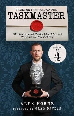 A man in a suit holds a bust of a head, standing against a dark blue patterned background; the book title and author are prominently displayed at the top and bottom.