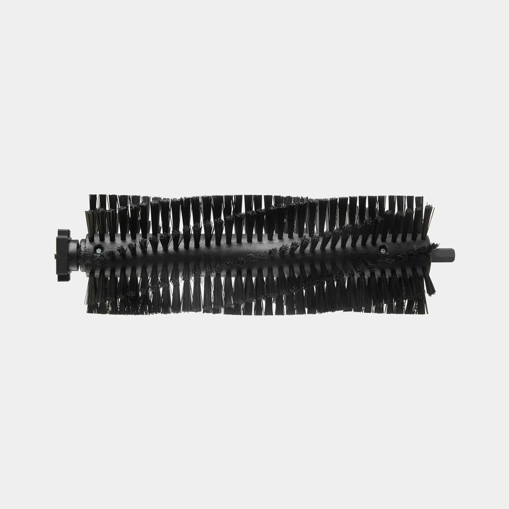 Black brush attachment for a 1500W artificial grass cleaner, featuring stiff bristles arranged in rows for effective cleaning, with a cylindrical shape and a connector at one end.