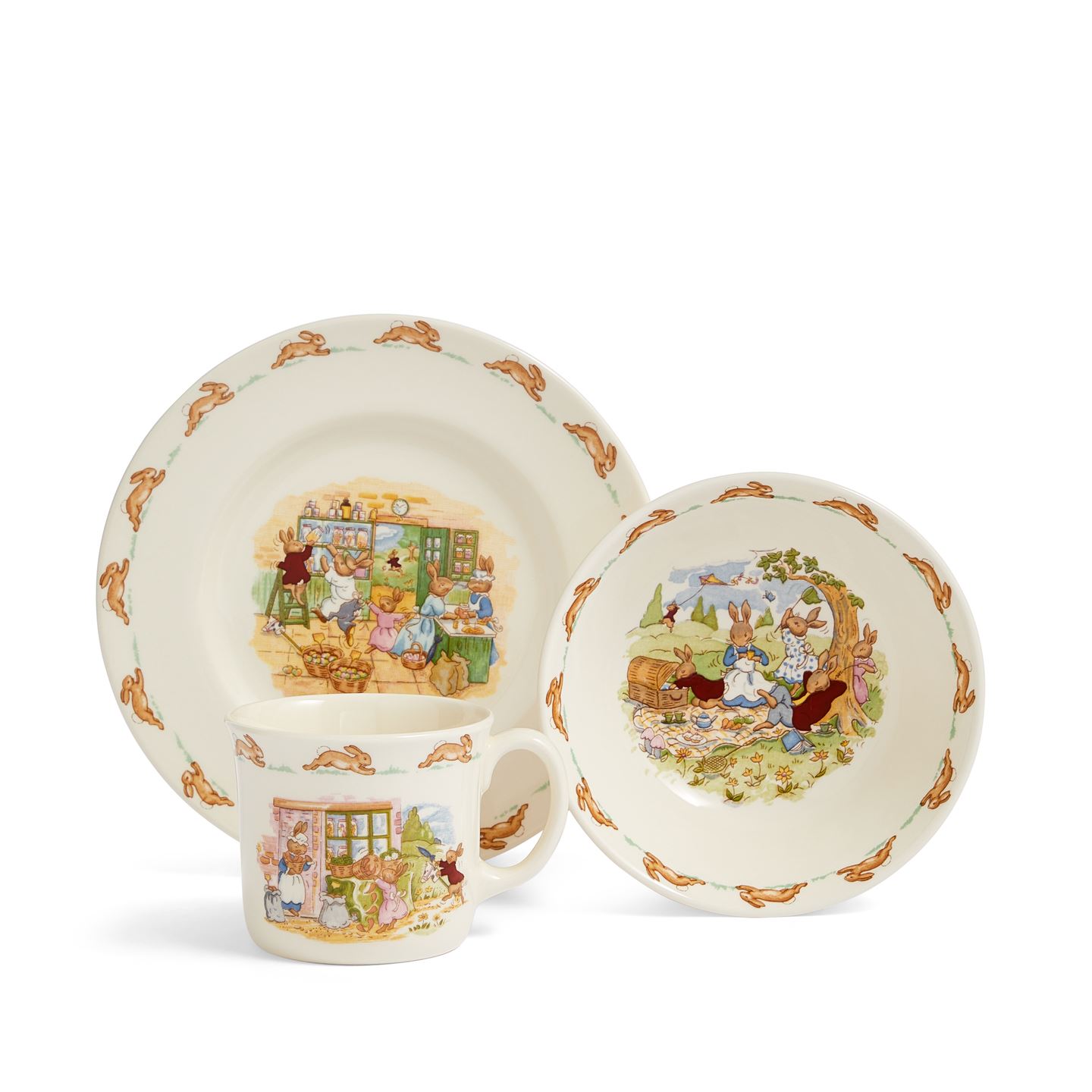 Three-piece set featuring a bowl, plate, and mug, all in cream-colored ceramic with charming Bunnykins illustrations and a decorative orange bunny border.