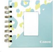 Canon Zoemini Photo Album featuring a pastel blue cover with a leopard print design in yellow and light blue, spiral binding, and a blank photo window on the front.