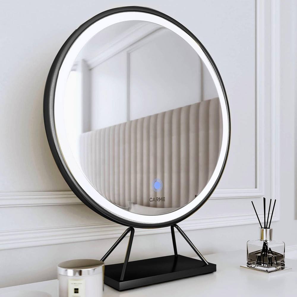 Large round black frame LED makeup mirror with a touch sensor, featuring a bright circular light and a sleek black base, set against a light-colored wall.