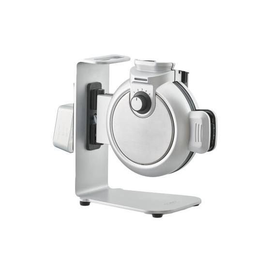 Silver and black CASO Design Waffle Maker with a sleek, modern design, featuring a circular cooking plate, adjustable temperature dial, and a sturdy base for stability.