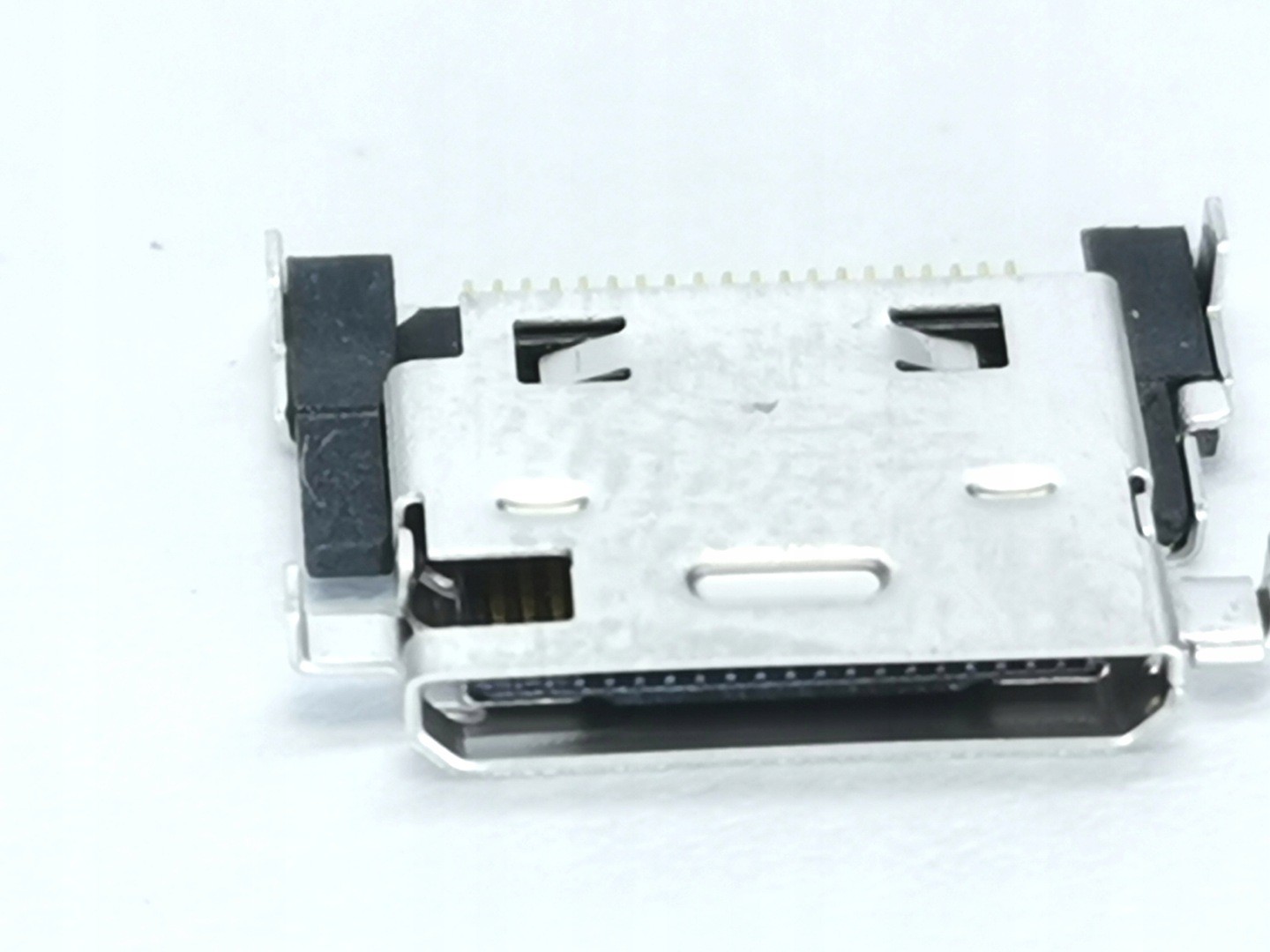 Silver metal USB connector with black plastic components, featuring a rectangular shape and multiple pins for connectivity, designed for Samsung D800, X820, and Z170 models.