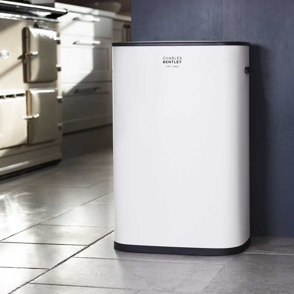 White 55L sensor bin by Charles Bentley, featuring a sleek design with a smooth finish and a black base, positioned in a modern kitchen setting.
