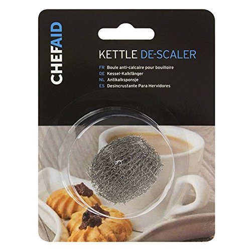 Stainless steel kettle descaler in a circular mesh ball, packaged on a card featuring a cup and pastries in the background, labeled with "Chef Aid" branding.