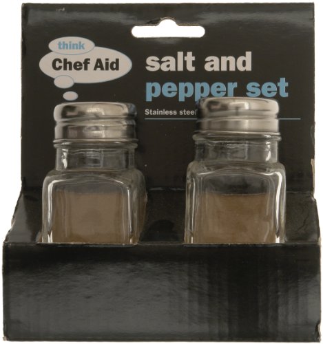 Clear glass salt and pepper shakers with stainless steel lids, displayed in a black cardboard packaging labeled "Chef Aid Salt and Pepper Set."