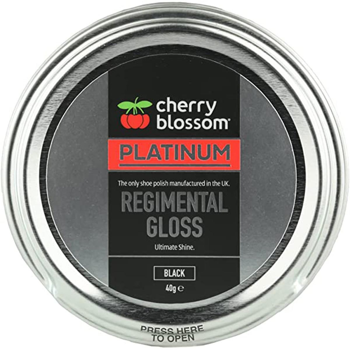 Cherry Blossom Black Regimental Gloss in a 40g tin, featuring a sleek silver lid, bold black label with red accents, and text highlighting its ultimate shine for shoes.