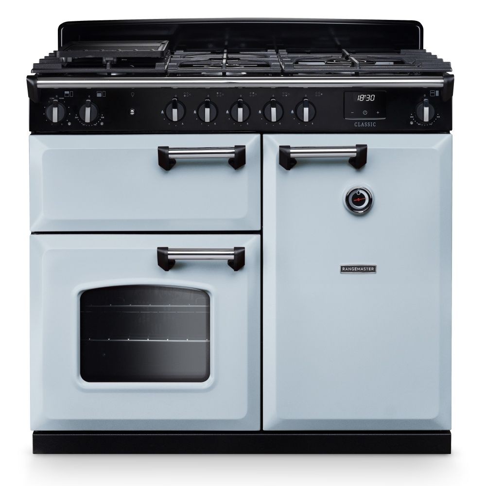 Classic 100cm dual fuel cooker in misty blue with chrome accents, featuring a five-burner gas hob, two ovens, and distinctive black knobs and handles.