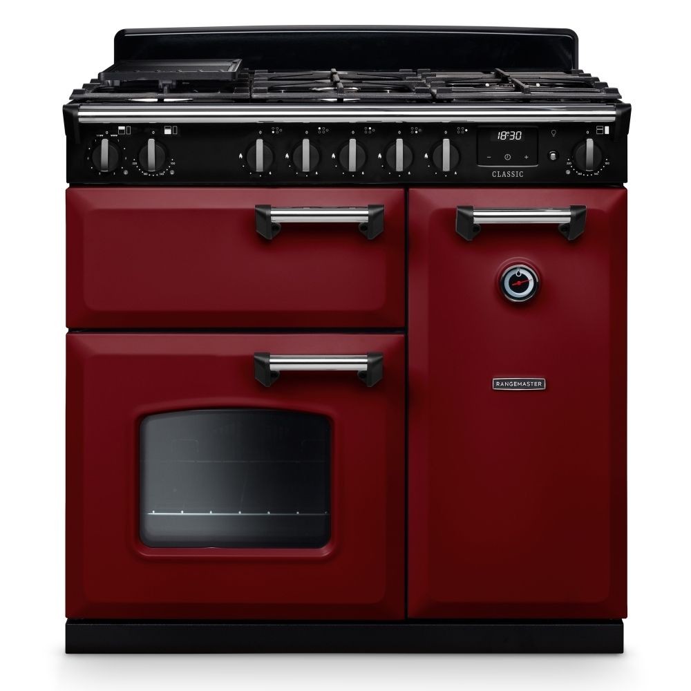 Classic 90cm dual fuel cooker in Bordeaux red with chrome accents, featuring a gas hob, multiple control knobs, and an oven with a glass window and a round handle.