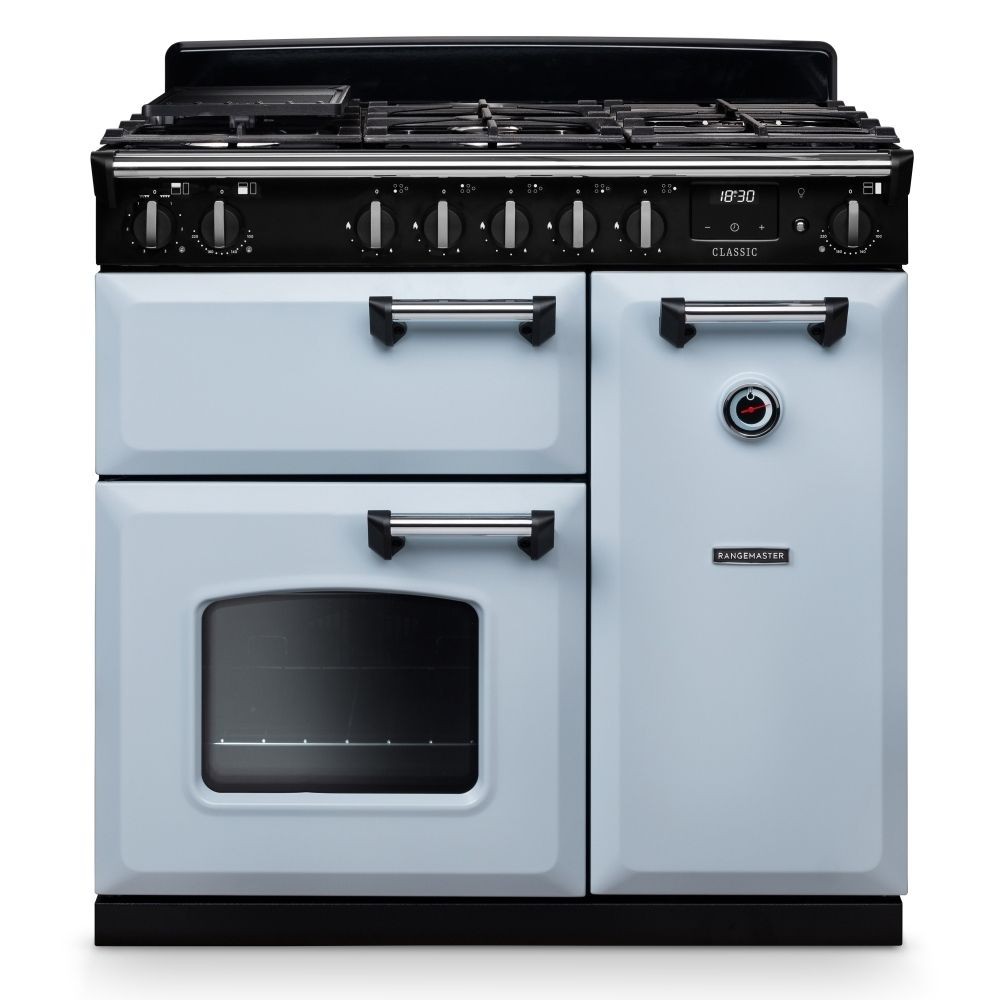 Classic 90cm dual fuel cooker in misty blue with chrome accents, featuring a five-burner gas hob, two ovens, and sleek black control knobs.