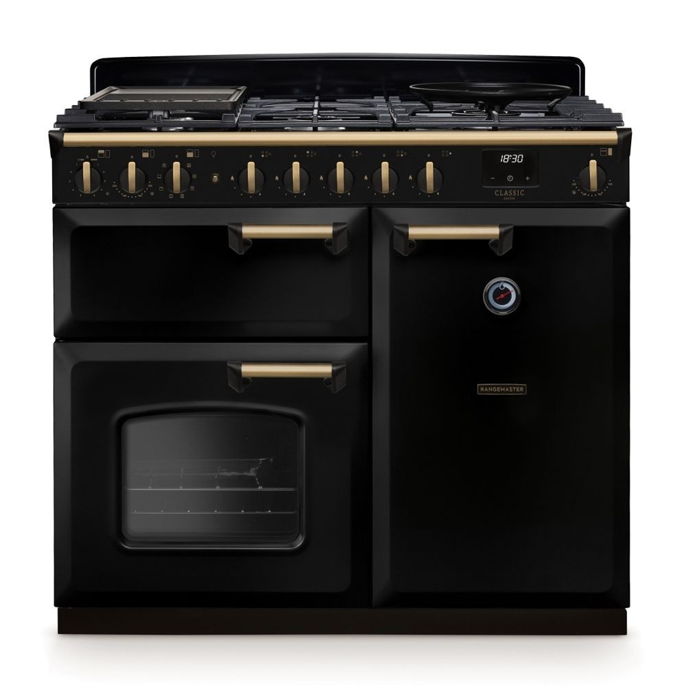 Classic Deluxe 100cm dual fuel range cooker in black with antique brass accents, featuring multiple burners, oven with glass door, and elegant control knobs.