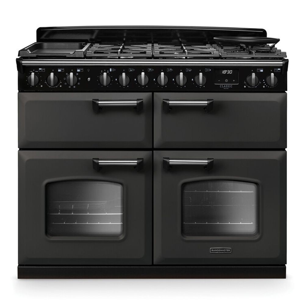 Classic Deluxe 110cm dual fuel range cooker in slate and chrome, featuring a black finish, multiple gas burners, chrome knobs, and two large oven compartments with glass doors.