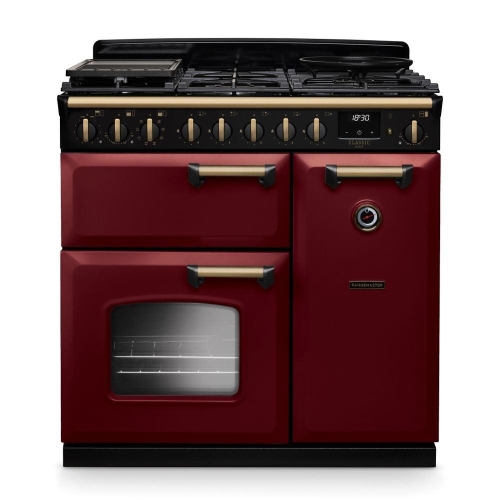 Classic Deluxe 90cm dual fuel range cooker in Bordeaux red with antique brass accents, featuring a black gas hob, multiple burners, and two ovens with a retro design.