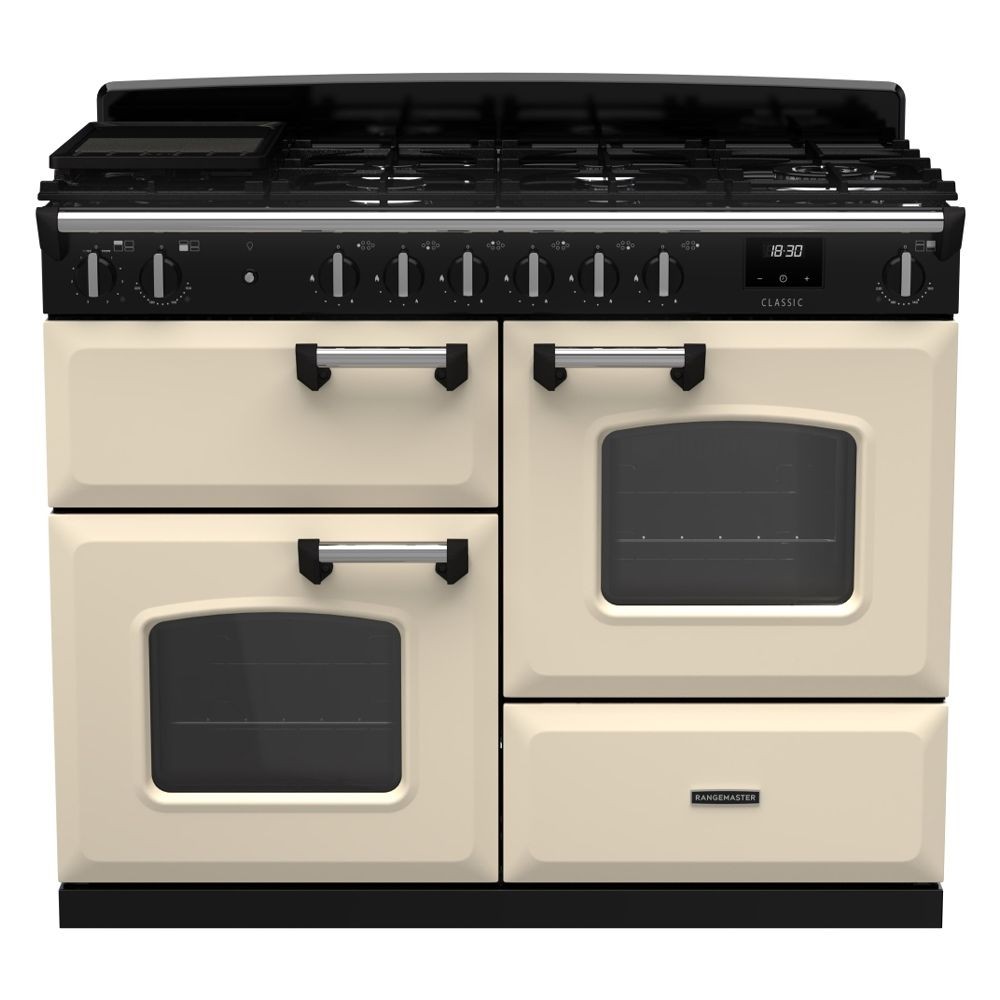 Classic OC 110cm dual fuel cooker in pale cream and chrome, featuring a black control panel, six gas burners, two ovens with glass doors, and chrome handles.