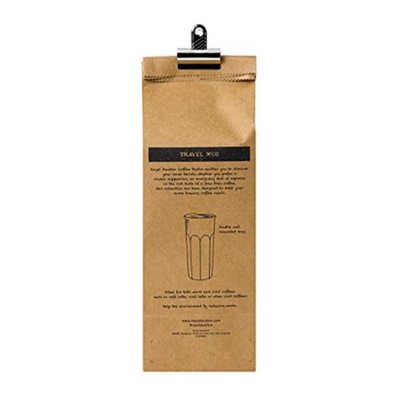 Ceramic travel mug in a sleek design, featuring a glossy white finish with a textured grip, accompanied by a brown kraft paper packaging with product details.