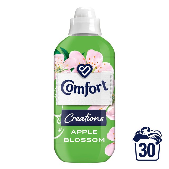 Green plastic bottle of Comfort Fabric Conditioner featuring apple blossom design, with a white label displaying "Comfort Creations" and "30 washes" icon.