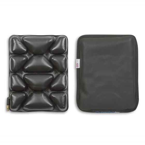 Black ComfortAir Motorcycle Seat Cushion with a textured surface and air-filled chambers for comfort, featuring a smooth backing for easy attachment.