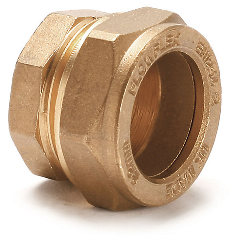 Brass compression stop end fitting, 35mm size, featuring a hexagonal shape with engraved markings and a smooth finish, designed for plumbing applications.