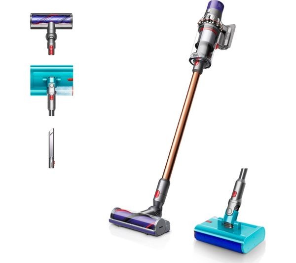 Dyson Cyclone V10 Submarine cordless vacuum in nickel and copper, featuring a slim design, a purple and silver handle, and a turquoise wet and dry cleaning head attachment.