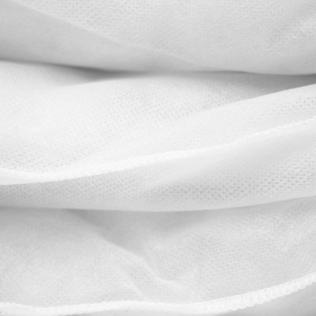 White Corovin mattress protectors featuring a soft, breathable fabric with a smooth texture and stitched edges for durability and protection.