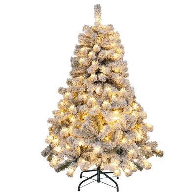 4.5-foot green flocked Christmas tree with warm LED lights, featuring a full, bushy design and a sturdy black metal stand.