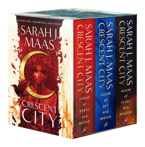 Hardcover box set of the Crescent City series by Sarah J. Maas, featuring three books with vibrant red, blue, and green covers, all housed in a decorative box with a crescent moon design.
